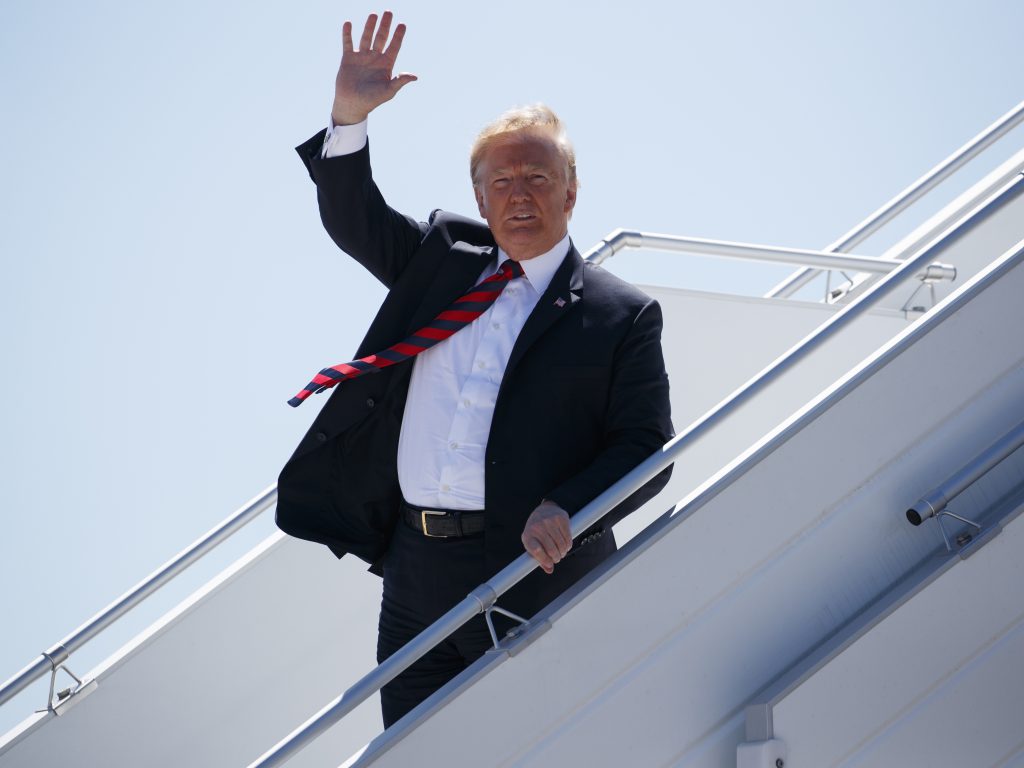 President Donald Trump steps off Air Force One as he arrives for the G-7 summit in Canada on June 8. President Donald Trump steps off Air Force One as he arrives for the G-7 summit in Canada on June 8. (Evan Vucci/AP)