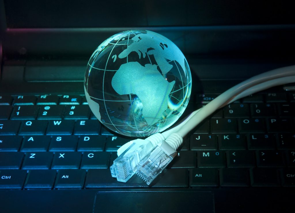 Internet technology earth globe Abstract Internet technology earth globe against fiber optic background