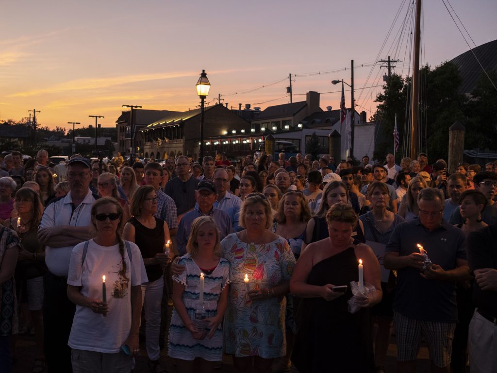 A crowd gathered in downtown Annapolis on Friday to honor five people who were killed in Thursday’s attack on the Capital Gazette offices. A crowd gathered in downtown Annapolis on Friday to honor five people who were killed in Thursday's attack on the Capital Gazette offices. (The Washington Post/Getty Images)