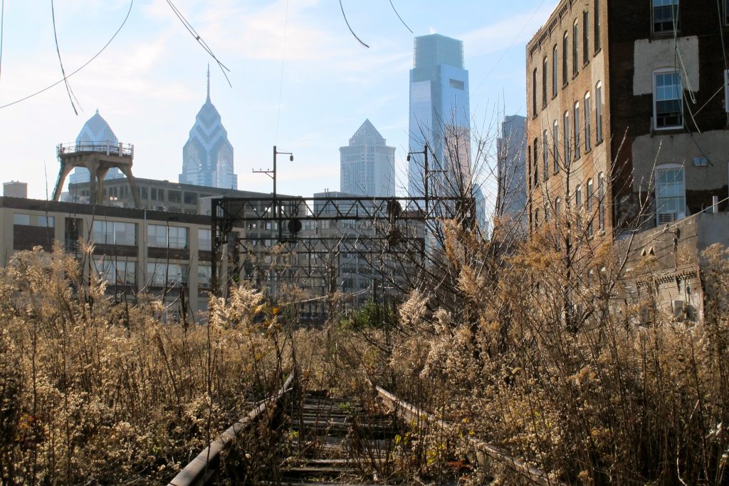 http-planphilly-com-eyesonthestreet-wp-content-uploads-2011-12-readingviaduct-jpg.original A 2011 view of the elevated Reading Viaduct in the Callowhill neighborhood. A now-refurbished area will open as the Rail Park this month. (PlanPhilly)