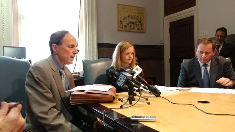Rob Dubow (left), Philadelphia finance director, and others discuss school funding in the City Council's budget plan. (Tom MacDonald/ WHYY)