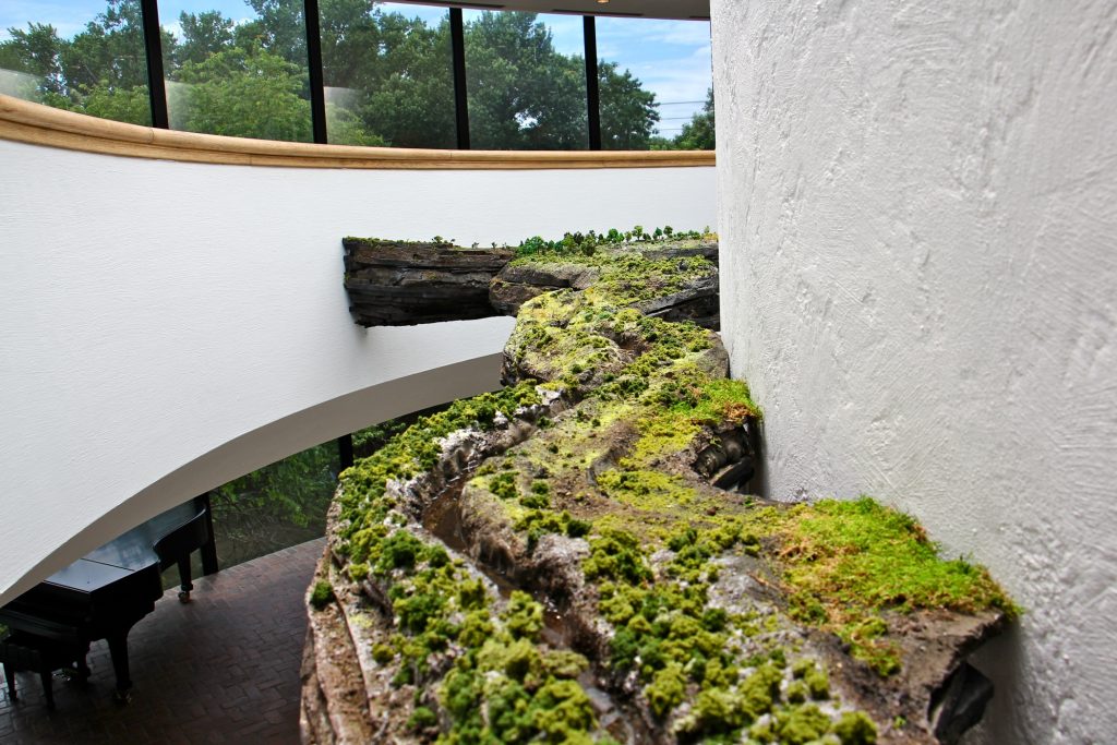lead2018 06 21-e lee-chadds ford brandywine museum-natural wonders exhibit A miniature version of the Brandywine River winds around the spiral staircase in the three-story atrium of the Brandywine River Museum. The commissioned work, by Kathleen Vance, is part of