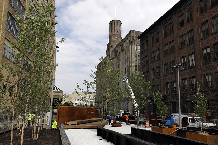 Elevated Rail Park Philadelphia Work continues at the Rail Park, Thursday June 7, 2018 in Philadelphia. The quarter-mile-long Rail Park is scheduled to open to visitors Thursday June 14, the first phase of a park that supporters hope will eventually span 3 miles through the center of Philadelphia via former Reading Railroad tunnels, rail cuts and elevated platforms. The end result would be about twice the length and width of New York's High Line.(AP Photo/Jacqueline Larma)