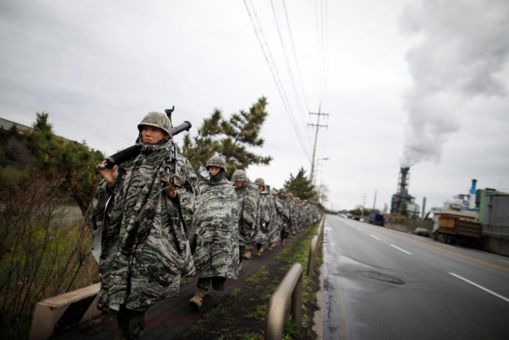 South Korean marines march during a military exercise as a part of the annual joint military training called Foal Eagle between South Korea and the U.S. in Pohang South Korean marines march during a military exercise as a part of the annual joint military training called Foal Eagle between South Korea and the U.S. in Pohang, South Korea, April 5, 2018. REUTERS/Kim Hong-Ji - RC16612DBE90