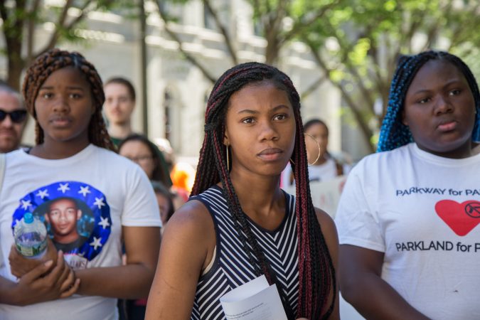 Dena Hill, 15, (center) is a rising sophomore at Parkway Center City Middle College, although she is not yet old enough to vote, she doesn't let that stop her from raising her voice about the change she wishes to see in her community. Around 70 supporters gathered together for a march from the Philadelphia Art Museum to Independence Mall 105 days after the 
