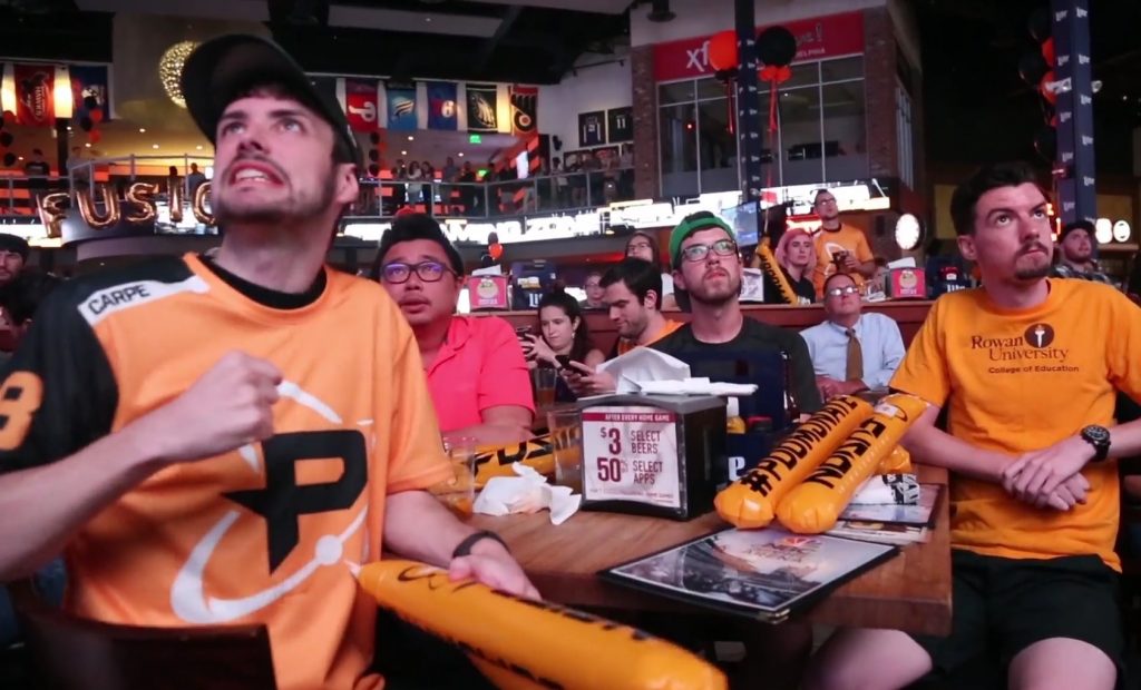 2018 07 12-e cohen-philadelphia xfinity live-overwatch league playoffs fusion Fans of the professional video gaming team, the Philadelphia Fusion, gather at Xfinity Live to watch the first round in the Overwatch League playoffs. (Emily Cohen/WHYY)