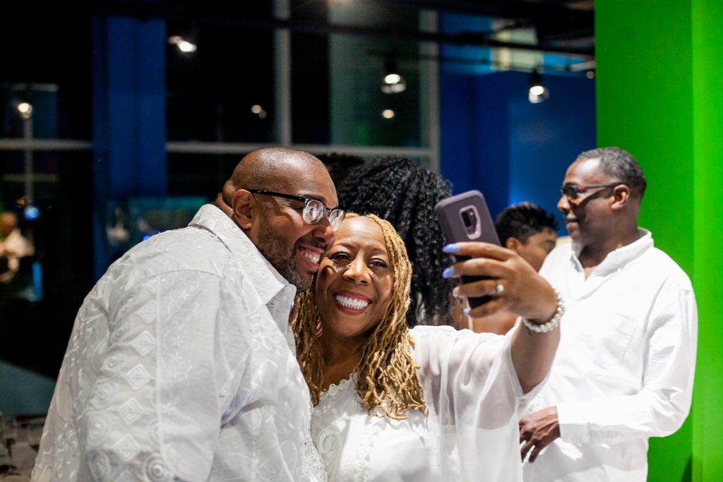2018 07 14- b larrison- camden nj- an all white affair at adventure aqaurium -9 Big Scott, organizer of the All White Affair at Adventure Aquarium in Camden, NJ is pictured with WBAS Radio personality Patty Jackson. (Brad Larrison for WHYY)