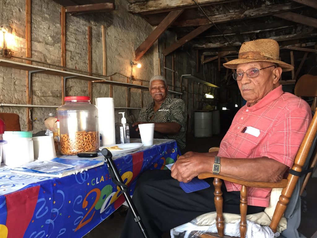 2018 07 25-a wolfman arent-bufus outlaw theodore jackson-philadelphia grays ferry-1918 riots Bufus Outlaw, 93, (right) and Theodore Jackson, 83, hang out in Outlaw's garage in Gray's Ferry. Although they weren't alive for the 1918 riots, they have seen the results ripple through their neighborhood to the present.