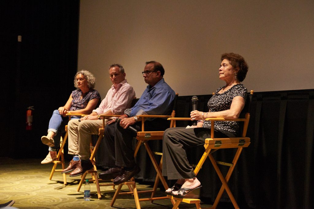 2018 07 26-n piserchio-elisa gambino neal broffman akhil tripathi judy tripathi-bryn mawr film institute-help us find sunil tripathi film screening 13 (From left) Executive Producer Elisa Gambino; Director Neal Broffman; father, Akhil Tripathi; and mother, Judy Tripathi; during a Q&A after a screening of 2015 documentary, Help Us Find Sunil Tripathi. The documentary was screened in Sunil's hometown for the first time on July 26, 2018, at the Bryn Mawr Film Institute, in Sunil's hometown. (Natalie Piserchio for WHYY)