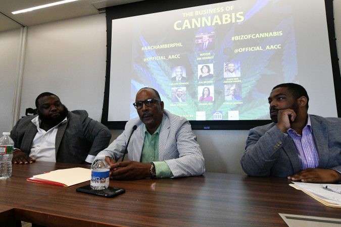 From left, state Rep. Jordan Harris, D-Philadelphia, Adrian Moody and Omar Woodard take part in a forum on the business of medicinal and recreational use of cannabis in the African-American community. (Bastiaan Slabbers for WHYY)