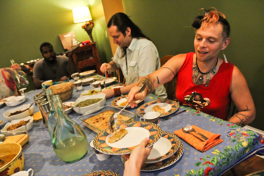 2018 7 18 k paynter faemyly table_-3 Francis Rose Subbiando serves plantains after a talk on the history of Creole Philadelphia at a Faemily Table dinner at her home in West Philadelphia. (Kimberly Paynter/WHYY)