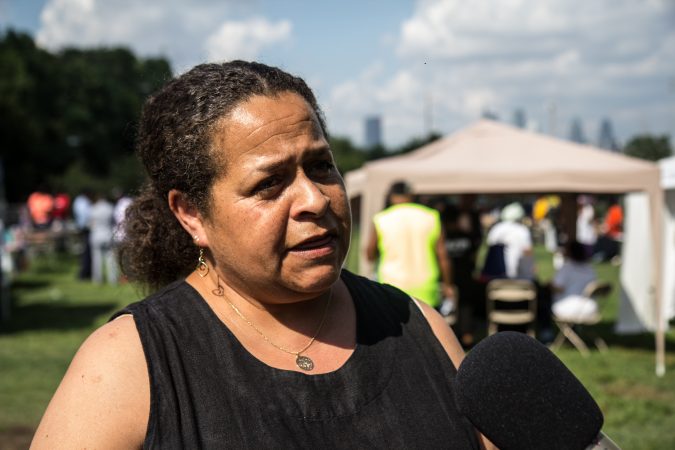 Claire Lomax, from Mt. Airy, shares her experience with violence at the the WURD event at Bartram’s Garden. (Kimberly Paynter/WHYY)