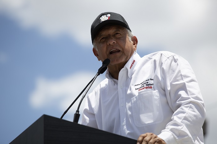 Presidential candidate Andres Manuel Lopez Obrador, known as AMLO, speaks to supporters at a campaign rally in Mexico City, Sunday, June 3, 2018. Mexico will hold general elections on July 1. (AP Photo/Anthony Vazquez)