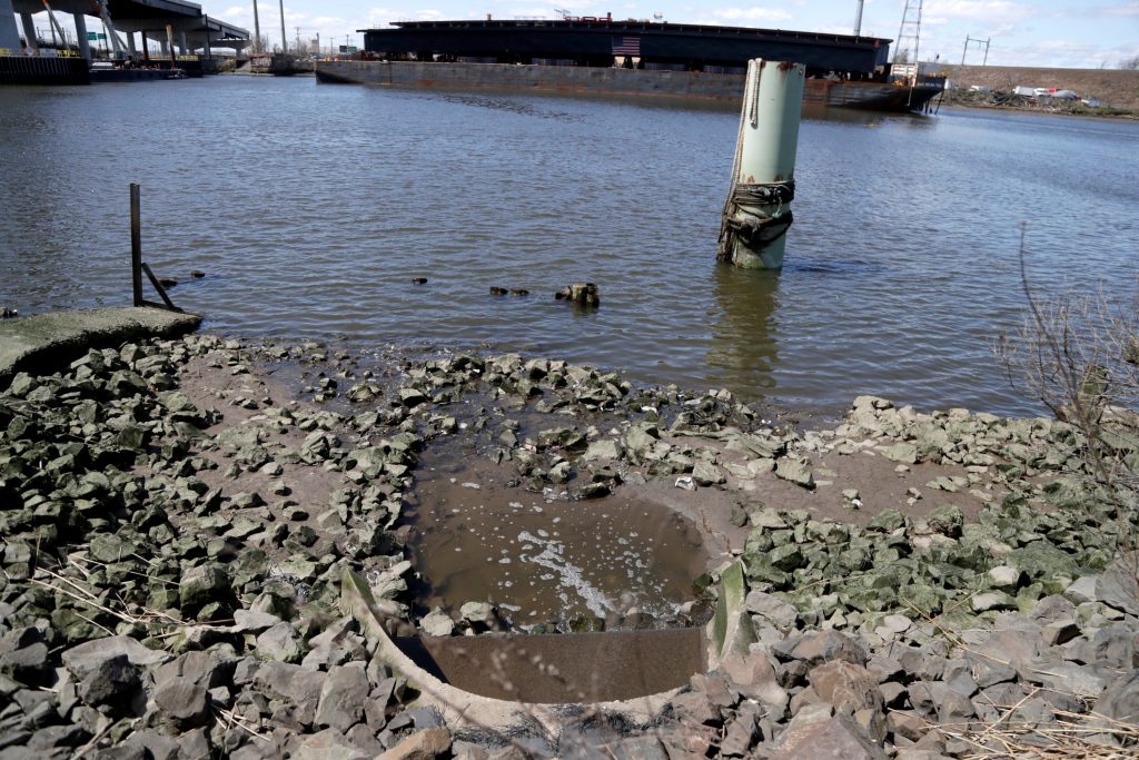 A spillway is seen along the Hackensack River near the construction of the new Newark Turnpike bridge on April 26 in Jersey City, N.J. (Julio Cortez/AP Photo)