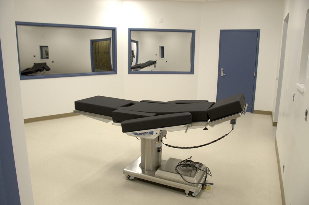 Nevada Execution Challenge This Nov. 10, 2016, file photo, released by the Nevada Department of Corrections, shows the execution chamber at Ely State Prison in Ely, Nev. Nevada plans to carry out its first execution in 12 years using a never-before-tried combination of drugs that drew a court challenge over concerns that a convicted murderer could suffer during the lethal injection. Scott Raymond Dozier is scheduled to die July 11, 2018. An American Civil Liberties Union of Nevada official called for Gov. Brian Sandoval or prisons chief James Dzurenda to stop the planned execution until questions about the process and drugs are answered. (Nevada Department of Corrections via AP, File)