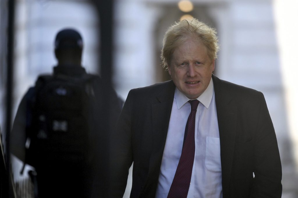 Britain Heathrow Johnson Britain's Foreign Secretary Boris Johnson, leaves the Foreign Office on his way to Downing Street for a cabinet meeting, in London, Tuesday June 26, 2018. Johnson visited Afghanistan for talks on Monday, missing a crucial parliamentary vote on expanding London's Heathrow Airport. (Victoria Jones/PA via AP)