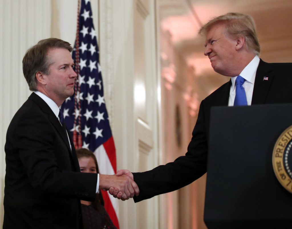 Donald Trump President Donald Trump shakes hands with Judge Brett Kavanaugh his Supreme Court nominee, in the East Room of the White House, Monday, July 9, 2018, in Washington. (AP Photo/Alex Brandon)