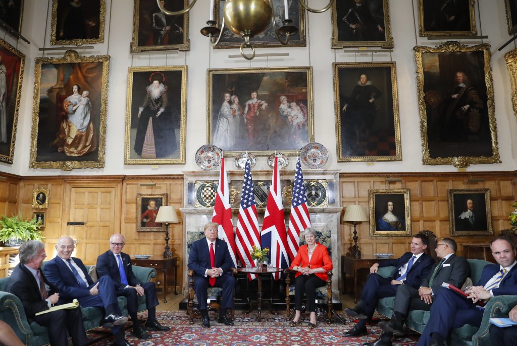 Donald Trump, Theresa May U.S. President Donald Trump, (center left), with British Prime Minister Theresa May, (center right) are seated during their meeting at Chequers, in Buckinghamshire, England, Friday, July 13, 2018. (Pablo Martinez Monsivais/AP Photo)