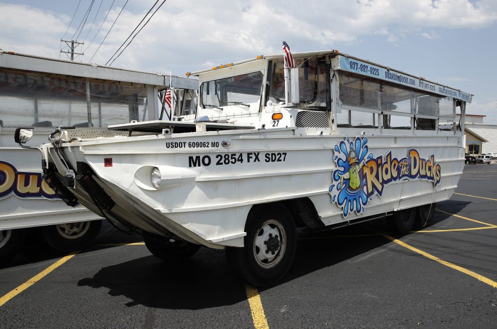 Missouri Boat Accident Duck Boats A duck boat sits idle in the parking lot of Ride the Ducks, an amphibious tour operator in Branson, Mo. Friday, July 20, 2018. The amphibious vehicle is similar to one of the company's boats that capsized the day before on Table Rock Lake resulting in 17 deaths. (Charlie Riedel/AP Photo)