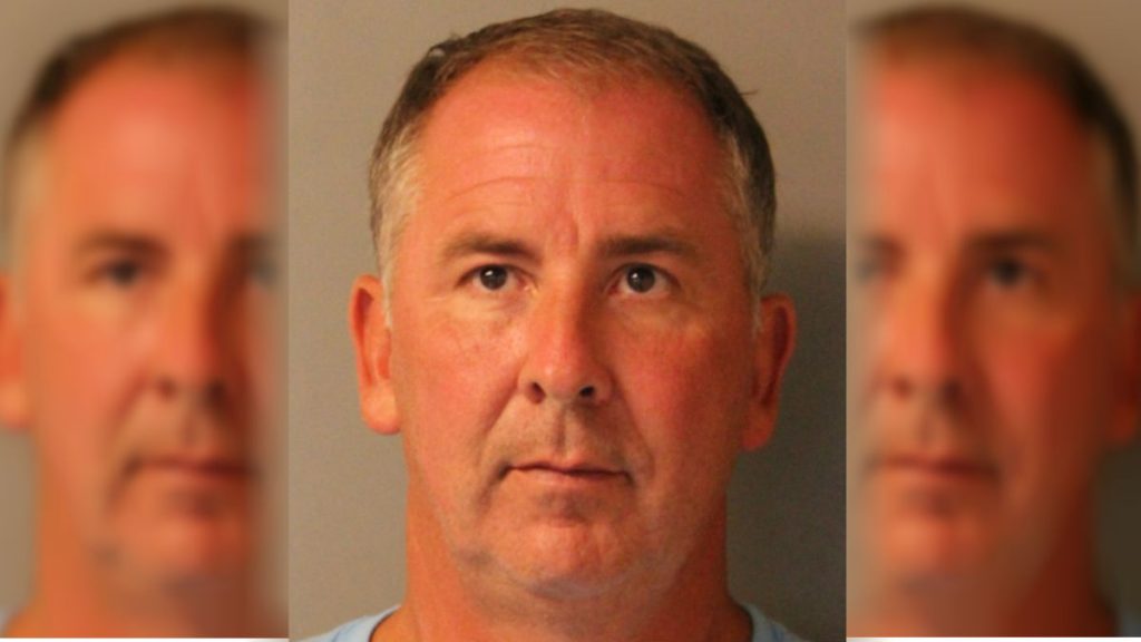 Atkins mugshot Former Delaware state Rep. John C. Atkins has been charged with domestic violence for the third time in 12 years. (Delaware State Police)