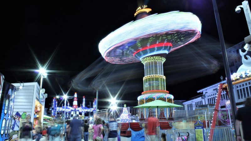 The riders blur by on the carousel at Gillian’s Wonderland Pier in Ocean City. (Bill Barlow/for WHYY)