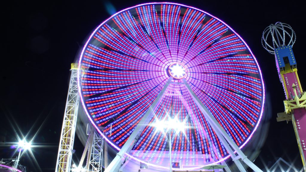 Playland ferris The lights of the Ferris wheel at Playland’s Castaway Cove amusement park are a blur. Motorists coming over the Ninth Street Causeway can watch these and the lights of the Gillian’s Wonderland Ferris wheel change and spin as they head into town. (Bill Barlow/for WHYY)