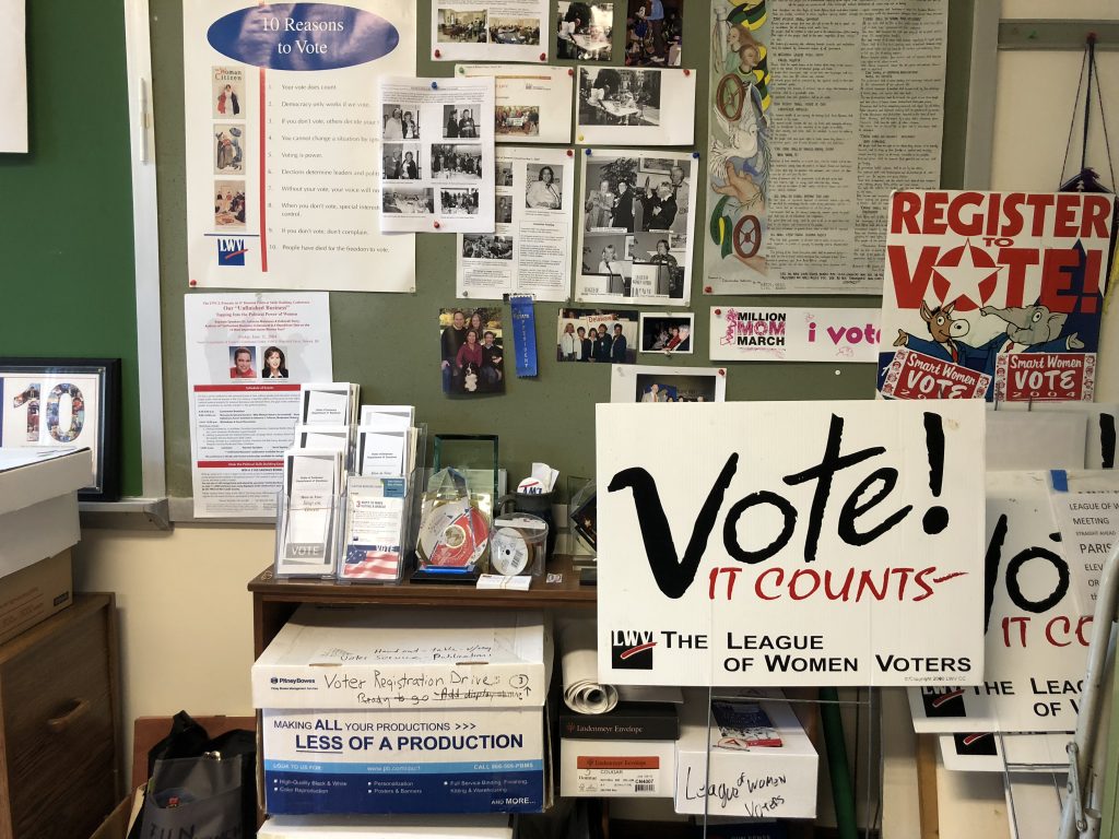 VOTE411 Signs inside the League of Women Voters of Delaware's Wilmington headquarters (Shirley Min/WHYY)