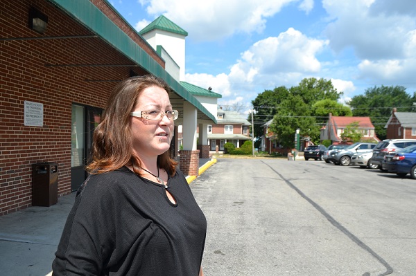 Stacy Zeigler stands for a portrait outside Open Arms Recovery Center in Hanover, York County. Zeigler has been off heroin for more than three years. She takes two doses of buprenorphine combined with naloxone each day. (Brett Sholtis/Transforming Health)
