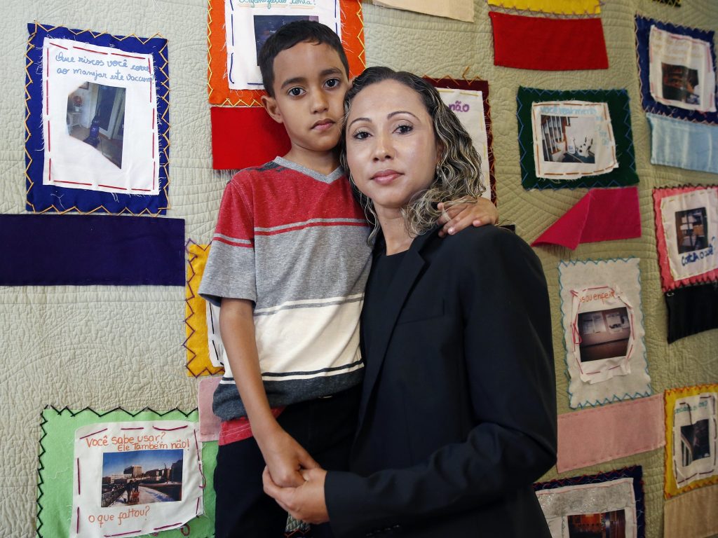 A Brazilian mother, who asked to be identified only as W.R., was reunified with with her 9-year-old son A.R. in Boston on July 16. A Brazilian mother, who asked to be identified only as W.R., was reunified with with her 9-year-old son A.R. in Boston on July 16.