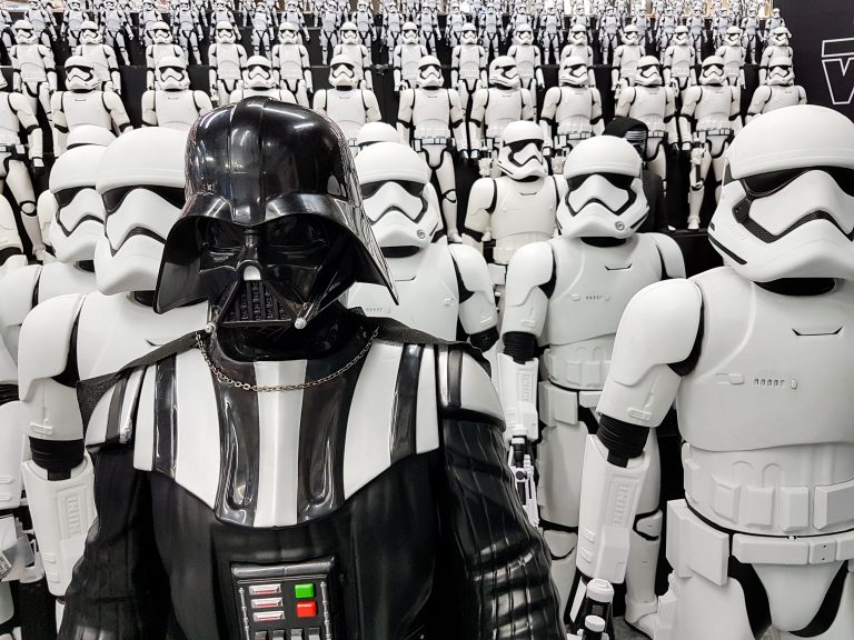 Star wars figures stormtroopers and Darth Vader