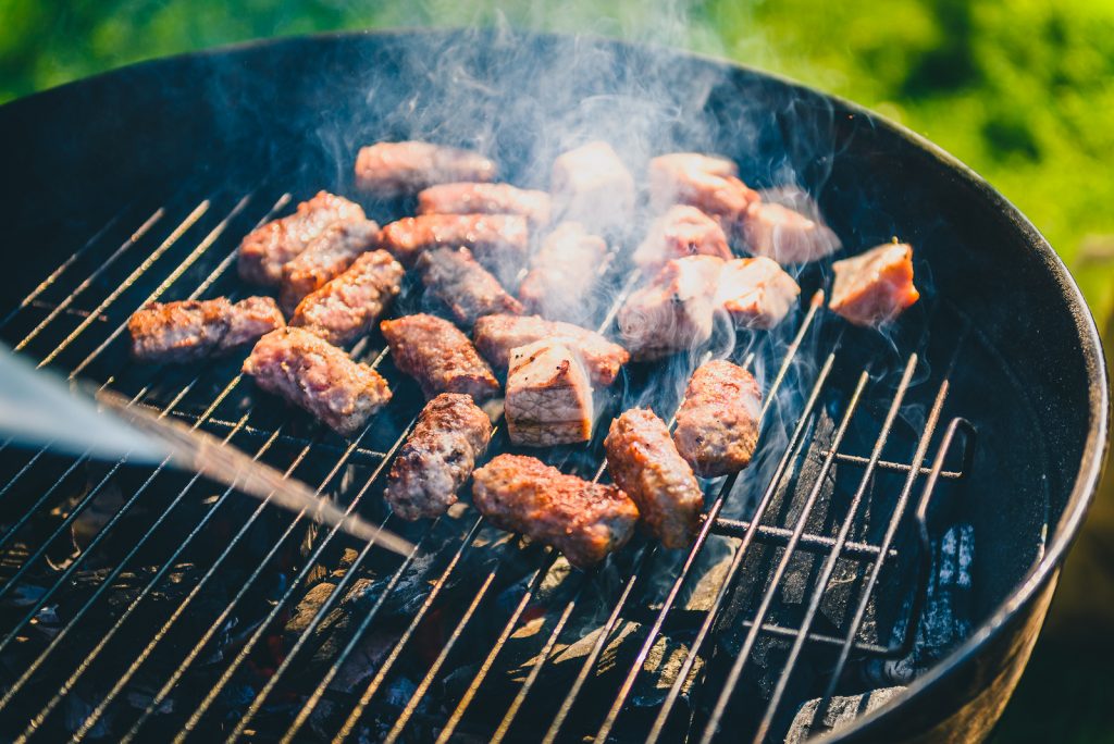 Grilling Delicious Variety Of Meat On Barbecue Charcoal Grill. (Bigstock/_jure)