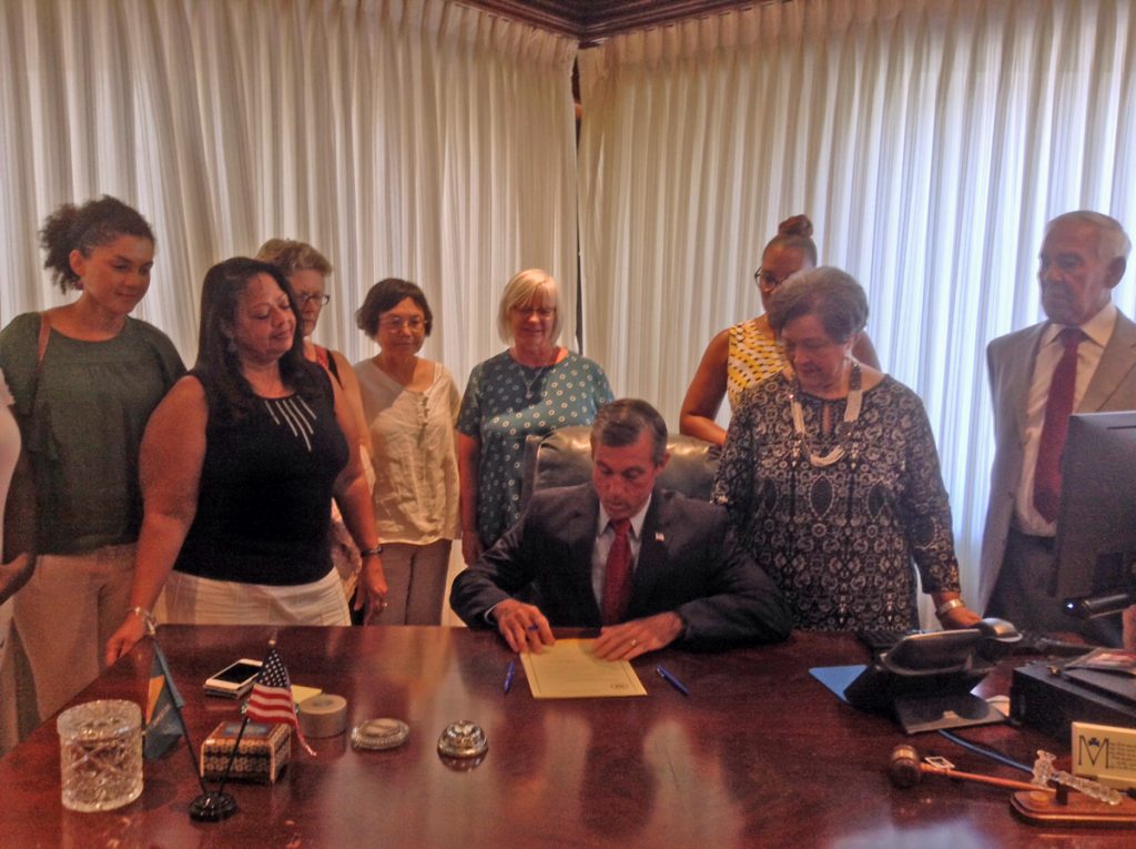 delsuspendcarneyx1200 Gov. John Carney signs a measure aimed at reducing the number of Delaware school suspensions. (Zoe Read/WHYY)