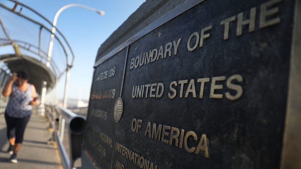 A plaque marks the U.S. border on the Paso Del Norte Port of Entry bridge which connects the U.S. and Mexico on July 23, 2018. As many as 2,551 migrant children ages 5 to 17 were separated from their families after they crossed into the U.S. from Mexico along the border. A plaque marks the U.S. border on the Paso Del Norte Port of Entry bridge which connects the U.S. and Mexico on July 23, 2018. As many as 2,551 migrant children ages 5 to 17 were separated from their families after they crossed into the U.S. from Mexico along the border. (Joe Raedle/Getty Images)