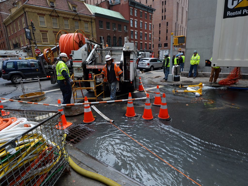 Verizon crews pump water from an access tunnel in Manhattan in 2012 after flooding from Superstorm Sandy knocked out underground Internet cables. Verizon crews pump water from an access tunnel in Manhattan in 2012 after flooding from Superstorm Sandy knocked out underground Internet cables. (Stan Honda/AFP/Getty Images)