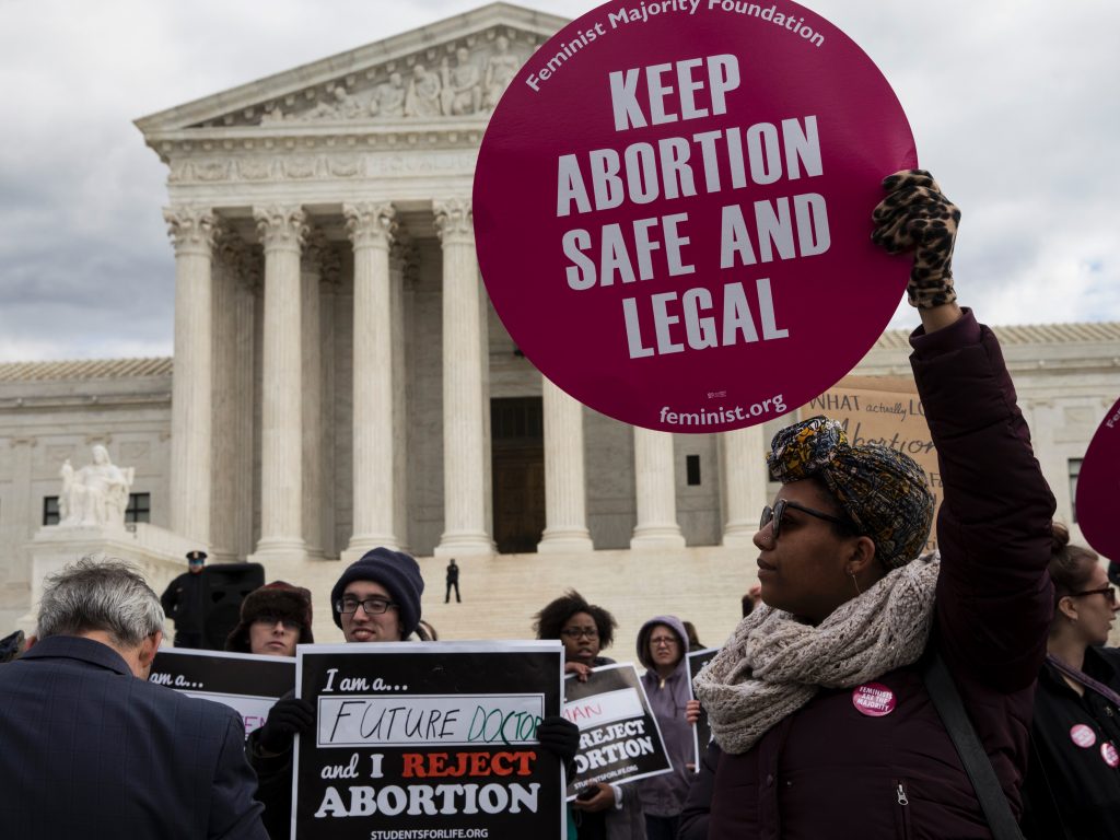 Abortion rights supporters and opponents protest outside the U.S. Supreme Court on January 27, 2017. The issue of abortion will spark millions of dollars in spending on advocacy for and against President Trump’s Supreme Court nominee. Abortion rights supporters and opponents protest outside the U.S. Supreme Court on January 27, 2017. The issue of abortion will spark millions of dollars in spending on advocacy for and against President Trump's Supreme Court nominee. (Zach Gibson/AFP/Getty Images)