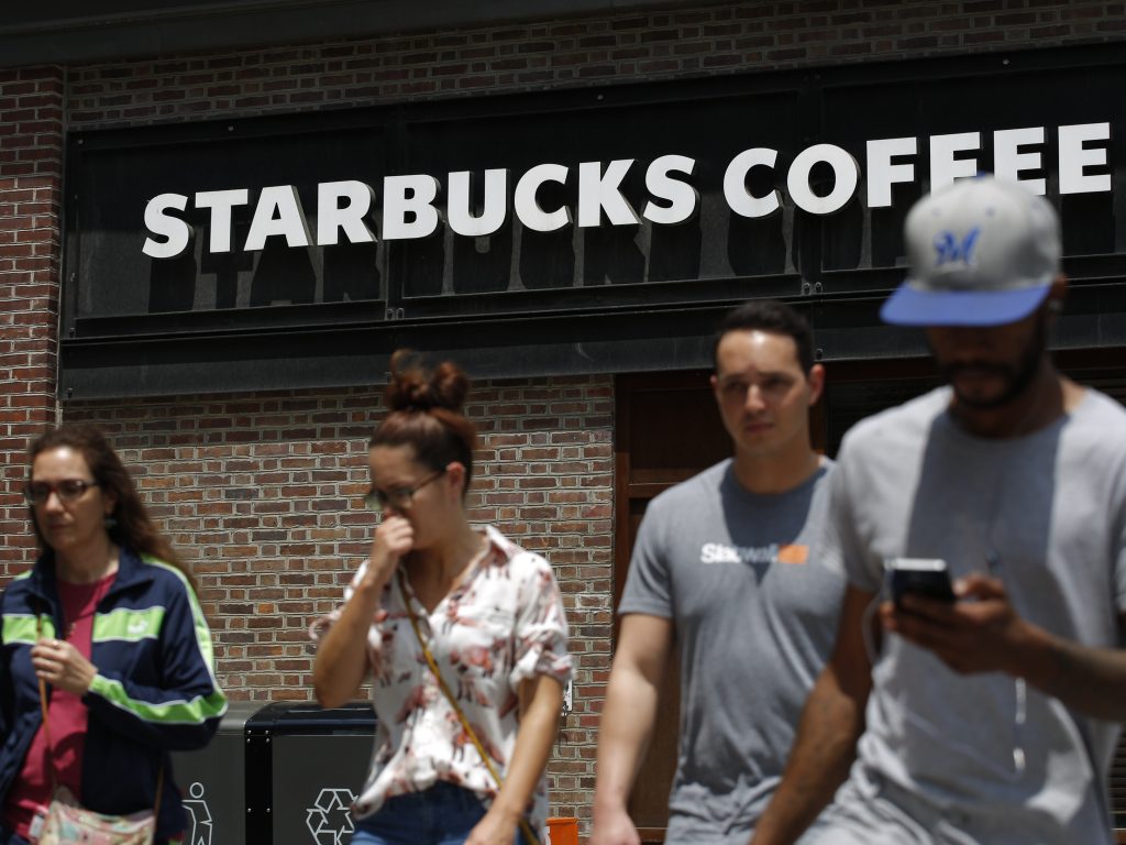 Pedestrians walk outside the closed Spruce St. Starbucks store on May 29, 2018 in Philadelphia, Pennsylvania.
Pedestrians walk outside the closed Spruce St. Starbucks store on May 29, 2018 in Philadelphia, Pennsylvania. (Kena Betancur/AFP/Getty Images)