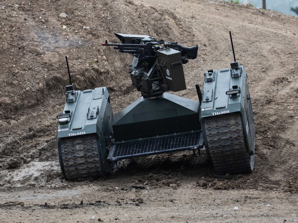 An autonomous tank is demonstrated in France last month. Leading researchers in artificial intelligence are calling for laws against lethal autonomous weapons. They also pledge not to work on such weapons. An autonomous tank is demonstrated in France last month. Leading researchers in artificial intelligence are calling for laws against lethal autonomous weapons. They also pledge not to work on such weapons. (Christophe Morin/IP3/Getty Images)