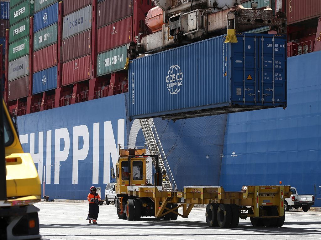 A shipping container is offloaded from the Hong Kong-based ship in Oakland, Calif., last month.
(Justin Sullivan/Getty Images)
