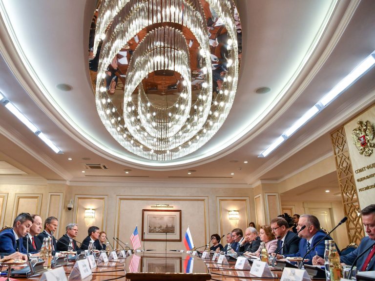 Members of a U.S. congressional delegation meet with members of the Russian Federation Council in Moscow on Tuesday. Republican senators met with Russia's Foreign Minister Sergei Lavrov on a rare visit to Moscow ahead of a summit between the countries' presidents Vladimir Putin and Donald Trump. (Yuri Kadobnov/AFP/Getty Images)