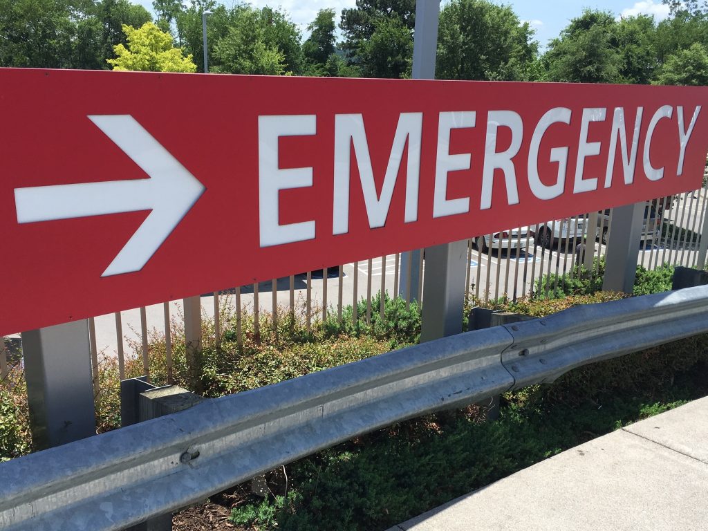 Emergency room doctors face long-term stress, making them especially prone to depression and suicide. Emergency room sign. (Blake Farmer/WPLN)