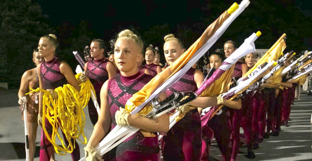 Cadets color guard members move to the field before their first home performance in 2018. (Jessica Griffin, Inquirer/Daily News) 