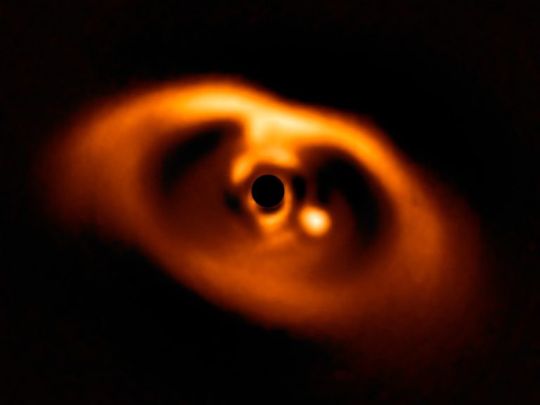When she saw photos of the young planet PDS 70 b, 