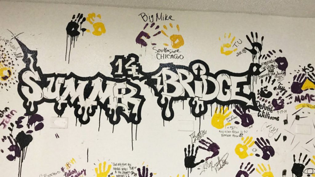Participants from the college’s Summer Bridge program traditionally leave their mark on campus in the school colors of black, purple and gold. (Delece Smith-Barrow/ The Hechinger Report)