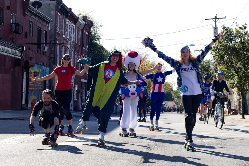 Second Annual Philly Free Streets Festival draws Thousands Members of Philly Roller Derby posed for photos during last year's Free Streets event, which took place on N. 5th Street. (Bastiaan Slabbers for WHYY)