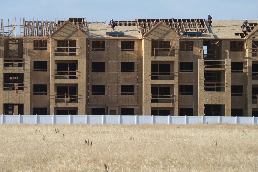 New construction rises over an empty field in Meridian, a suburb of Boise, Idaho. Today, home values have rebounded, but people who want to buy a new home are often priced out of the market. New construction rises over an empty field in Meridian, a suburb of Boise, Idaho. Today, home values have rebounded, but people who want to buy a new home are often priced out of the market.(Kyle Green for NPR)