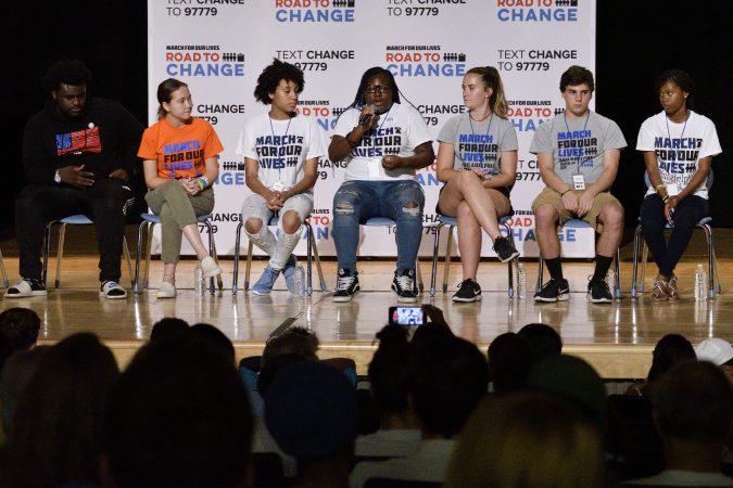Local students from Philly (in white shirts) and New Jersey, in grey shirts, are joined by students from Parkland, FL and around the country during a March For Our Lives National Tour stop in Philadelphia, on Tuesday (Bastiaan Slabbers for WHYY)