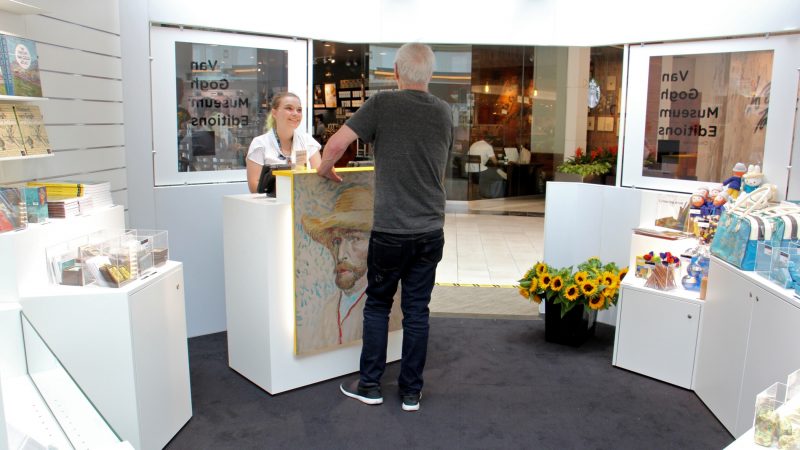 Visitors exit the pop-up museum through a small octagonal gift shop. (Emma Lee/WHYY)
