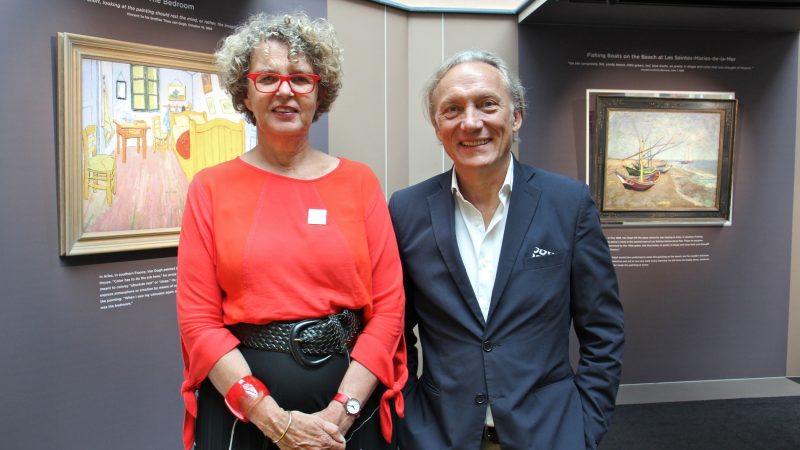 Riet Frissel (left), exhibition manager for the Vincent van Gogh Museum, and the artist's great-grandnephew, Willem van Gogh, are traveling with the exhibit. (Emma Lee/WHYY)