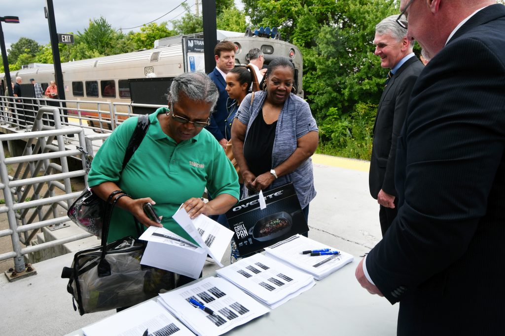 PCT Instalation Interapts ACRL Service till December After departing the train, Tropicana Casino employee Renee Wilson, of Lindenwold, looks over information about the temporary suspension of the Atlantic City line for positive train control or PTC installation. (Bastiaan Slabbers for WHYY)