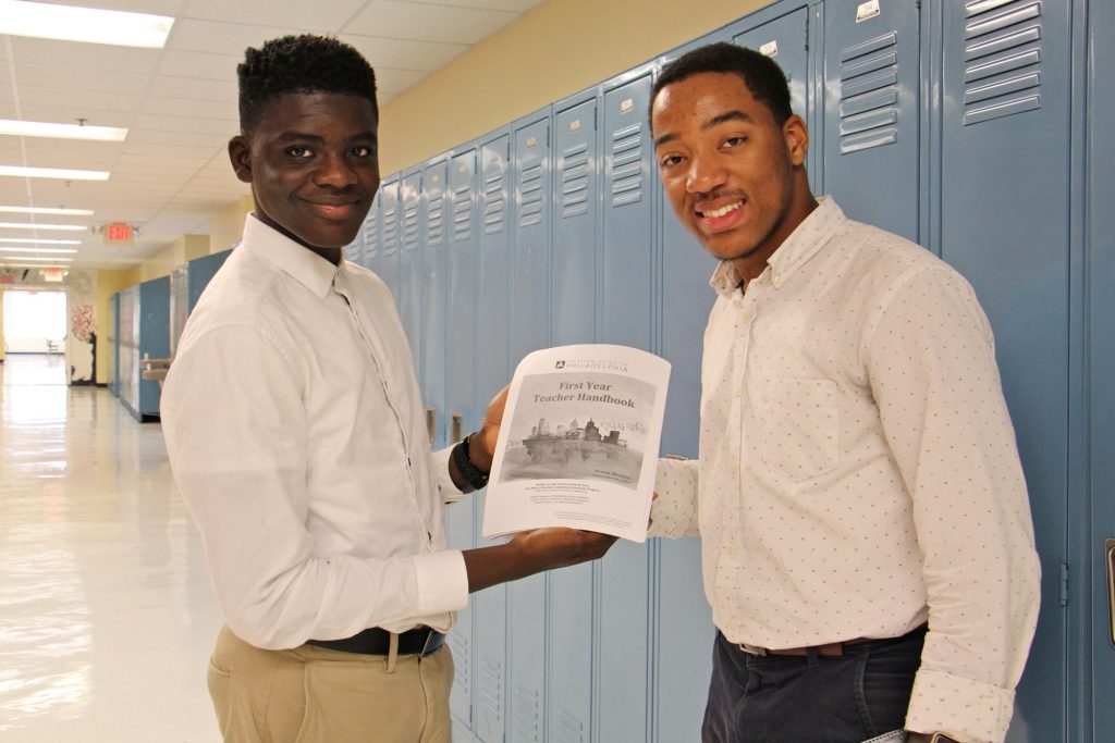 2018 08 21-e lee-khalid abogourin horace ryan-philadelphia science leadership academy-first year teacher handbook Science Leadership Academy students Khalid Abogourin (left), 17, and Horace Ryan III, 16, created a handbook for first year teachers that is being used in teacher orientations throughout the school district.